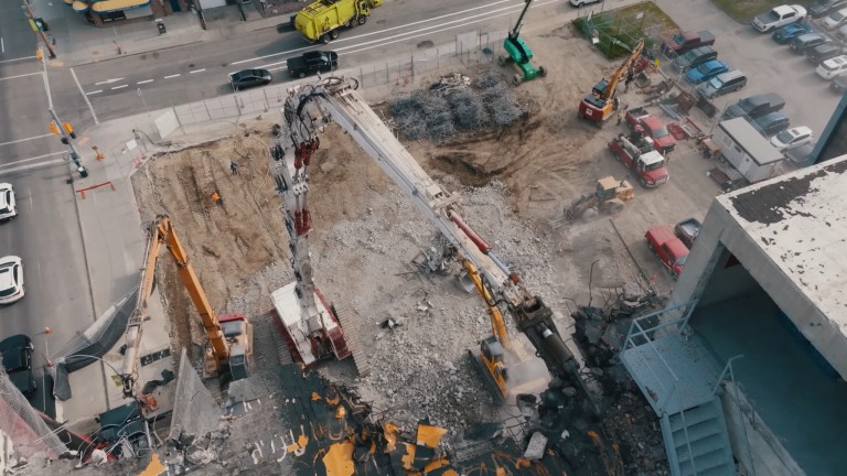 Pdi Takes Down Storey Calgary Building With Colossal Kobelco Excavator