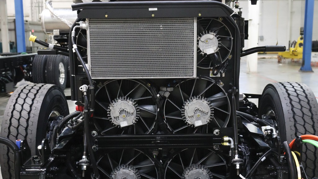 Autocar's new electric fan cooling system reduces fuel consumption and radiator clogging for refuse trucks