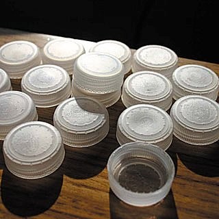 Plastics recyclers want caps on bottles