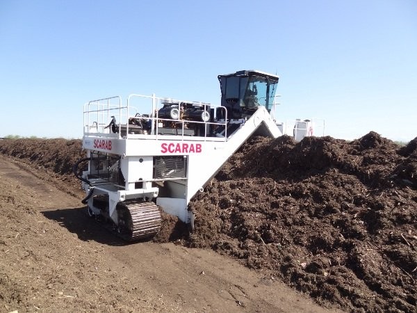 Scarab's latest turner model at Harvest Power's site in Tulare California uses a belt-drive, and is saving the operation up to 35 percent in fuel per day.