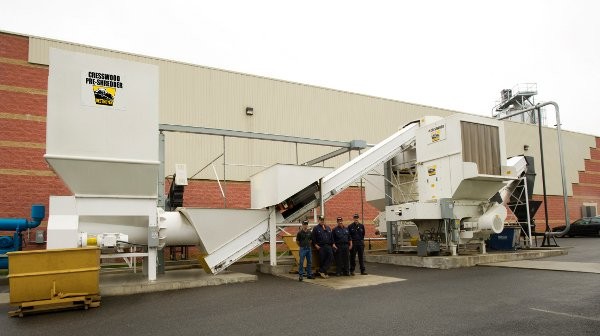 The Cresswood Two-Stage Chip Processing System custom grinds scrap pallets and lumber to produce green-cycled building material.