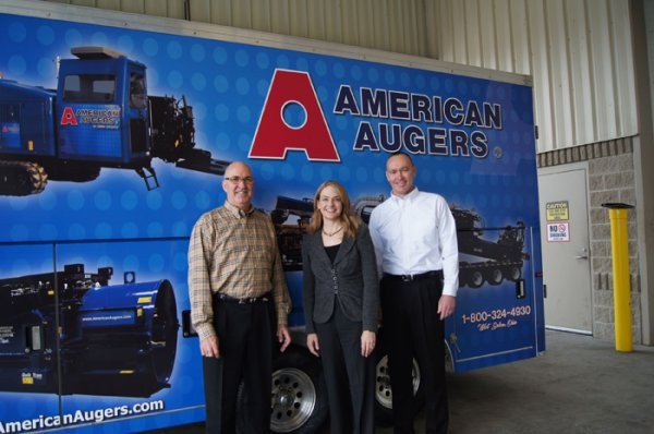(front left to right)  Rick Johnson, CMW’s Chief Operating Officer, Tiffany Sewell-Howard, CMW’s Chief Executive Officer, and David Hammonds, American Augers General Manager.