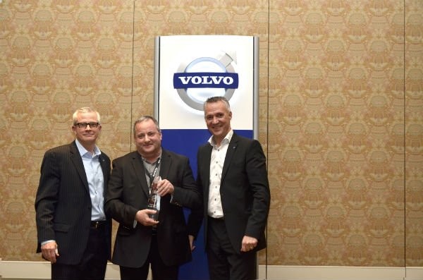 Expressway Trucks dealer principal Scott Lawson (center) receives the 2012 Canada Dealer of the Year award from (left ) Terry Billings, Volvo Trucks vice president – business development and (right) G&ouml;ran Nyberg, president, Volvo Trucks North American Sales &amp; Marketing.