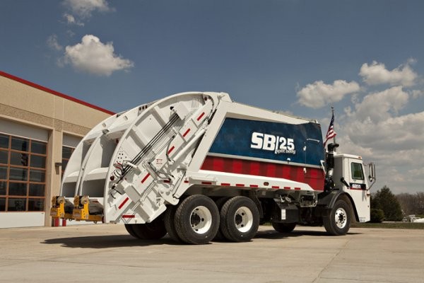 McNeilus displayed a total of 12 solid waste and recycling vehicles, including this 25-cubic yard Split Body Rear Loader, at Waste Expo in New Orleans, La.