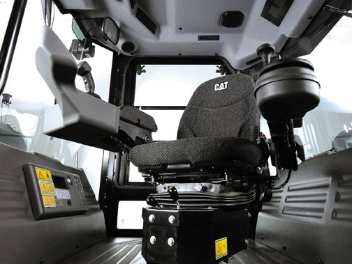 Hand wheel steering on Cat rollers eliminates front steering console Hand wheel steering on Cat rollers eliminates front steering console