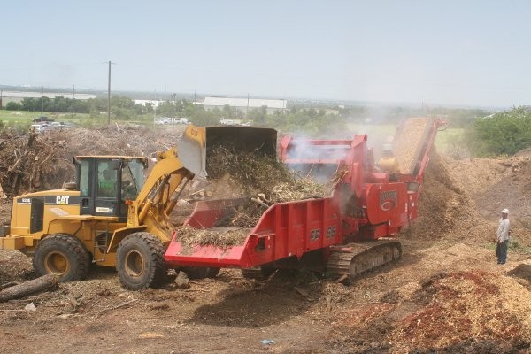 Rotochopper’s FP 66 horizontal grinder on tracks on site at Austin Landscape Supplies.