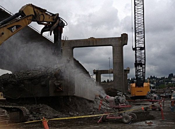 A BT-MGC unit (Gasoline Monsoon Complete with Oscillation) shown working on the Port Mann bridge demolition and construction project in Vancouver, B.C. (2013). The unit was delivered by Van Ed Equipment who reports that it has effectively controlled the dust issues throughout the duration of the massive project.