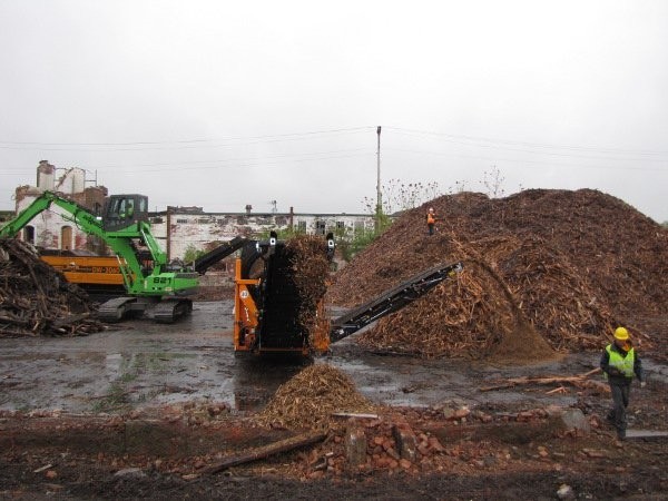 Costello Dismantling uses a Sennebogen 821 material handler with a mag-grab to feed their Doppstadt grinders and shredders