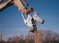 Concrete crusher also removes and cuts rebar