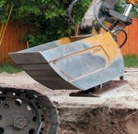Roller wheel and vibratory compaction buckets
