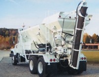 Rear discharge concrete mixers