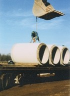 Precast concrete pipe handling