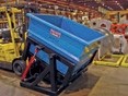 Remote controlled self-dumping hoppers