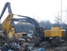 Customized excavator and loaders for scrap