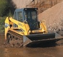 Compact track loader handles challenging terrain