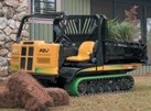 Turf-friendly rubber track loader