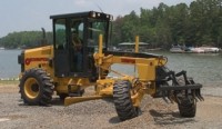 Grader has 50-degree turning radius