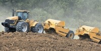 Four models of towed scrapers feature durable Caterpillar components and innovative designs for high productivity