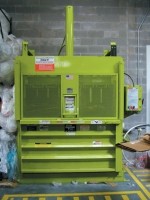 Environmentally-friendly vertical balers and compactors