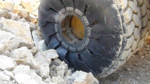 Innovative flexible polymer shield protects dump truck tires