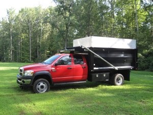 SuperSpring self-adjusting leaf spring enhancer for work trucks