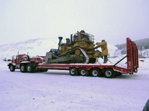 Rogers® Low-Boy Trailer Hauls Mining Equipment In Quebec
