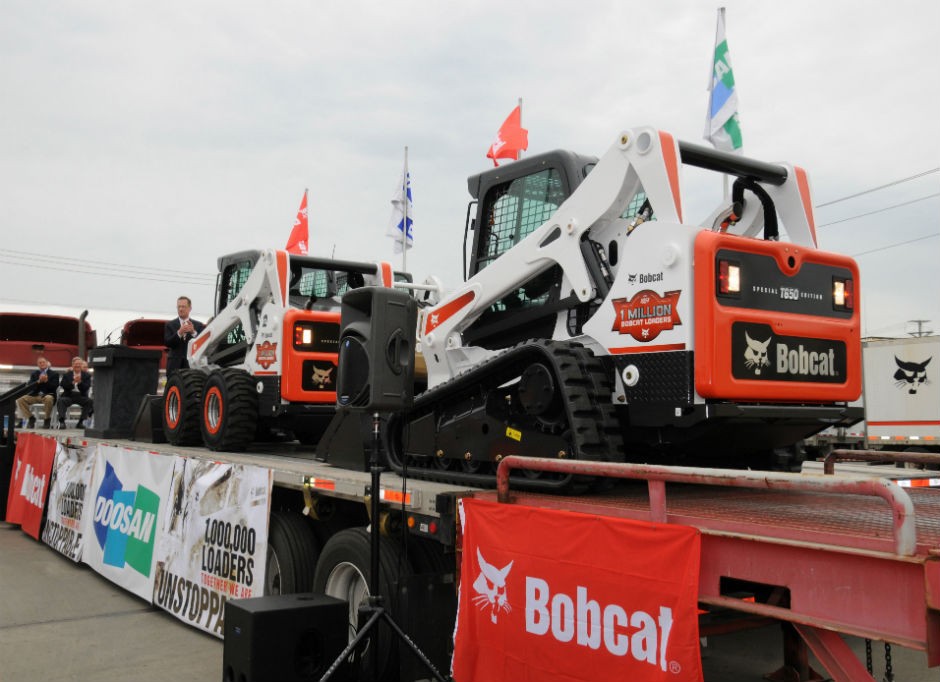 Two loaders rolled off the line during the Millionth Loader ceremony: loader number one-million, a skid-steer loader; and loader number one-million-one, a compact track loader version. 