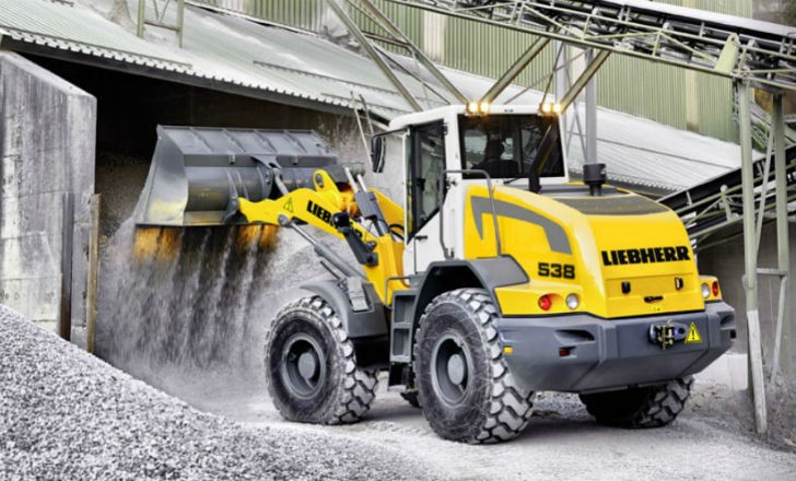 The Liebherr L538 wheel loader in operation, preparing and maintaining stockpile areas for loading into trucks, crushers, and/or plant hoppers.  