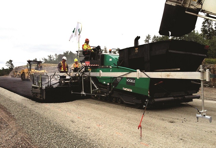 Wide screed simplifies paving and cuts costs