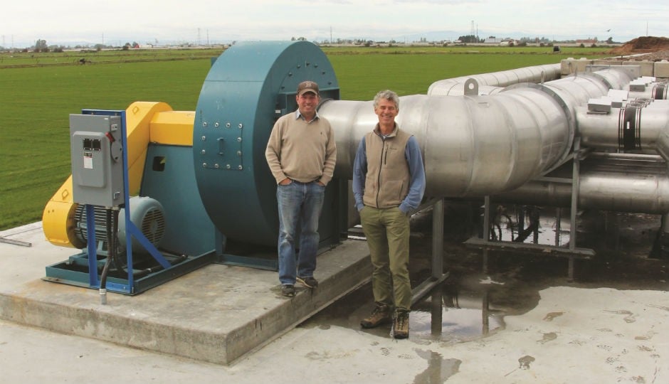 Daryl Goodwin and Michael Bryan-Brown in front of Enviro-Smart Organics’ newly installed reversing aeration and blower system.