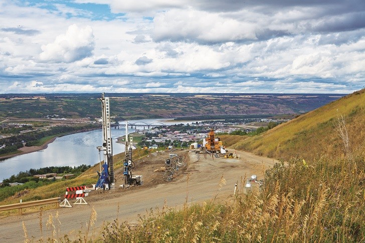 Doublestar Drilling worked to rescue Highway 744, which is perched on a sloping hillside and active landslide area overlooking Peace River Valley in Alberta. (Photo courtesy of Doublestar Drilling)