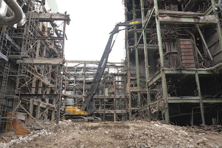 Reaching up high to clear out the chemical boiler plants.