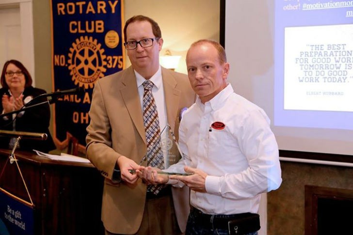 Rick Szabrak presenting Business Ethics Award to Brad Hutchinson, owner of Company Wrench