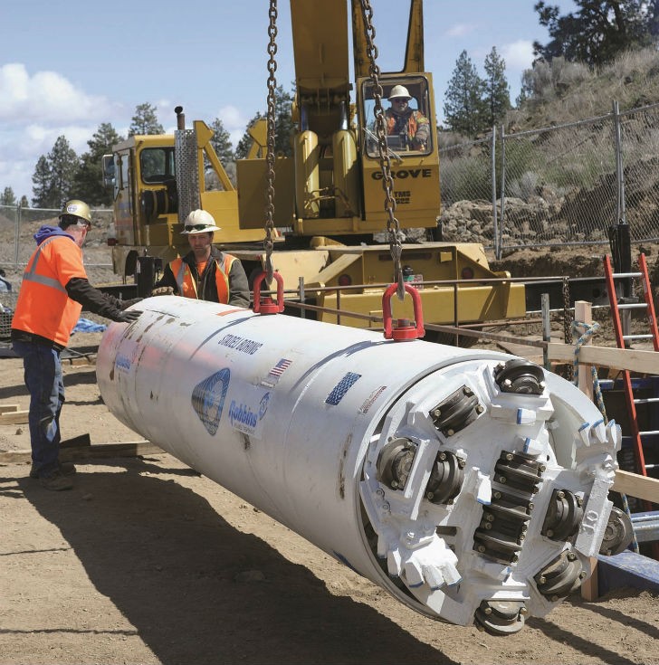 A prototype of the SBU-RC unit was tested at Bend, Oregon, where a general contractor needed to install 98 metres of 900-mm steel casing under railroad tracks, with close tolerances and in solid rock. A prototype of the SBU-RC unit was tested at Bend, Oregon, where a general contractor needed to install 98 metres of 900-mm steel casing under railroad tracks, with close tolerances and in solid rock.