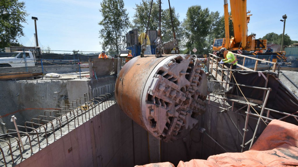 The 3.5-metre-diameter tunnel is approximately 30 metres below the river bed, and was constructed between two 60-metre-deep vertical shafts using a Caterpillar TBM named Squirrel. The TBM was lowered in February 2014 and removed on July 17. The 3.5-metre-diameter tunnel is approximately 30 metres below the river bed, and was constructed between two 60-metre-deep vertical shafts using a Caterpillar TBM named Squirrel. The TBM was lowered in February 2014 and removed on July 17.