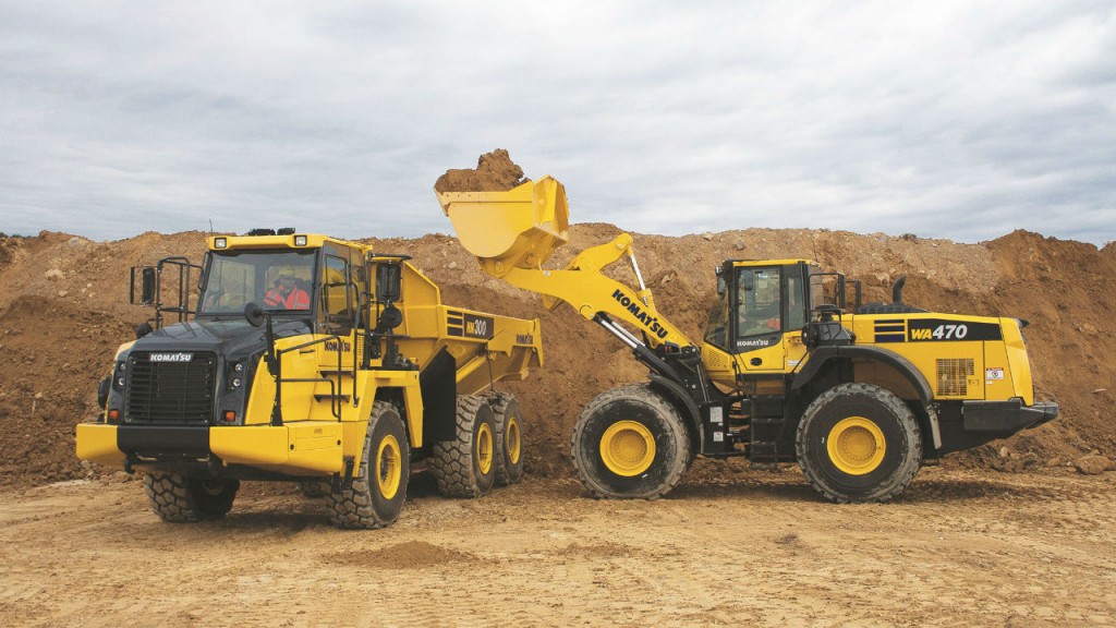 WA470-8 wheel loader loading HM300 articulated dump truck