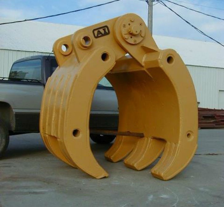 Designed for land clearing, raking, stacking, rehandling scrap, demolished and loose material.