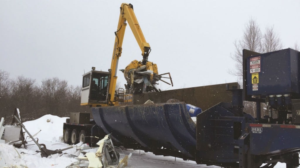 Overbuilt baler/loggers and car crushers key to mobile recycling in New Brunswick