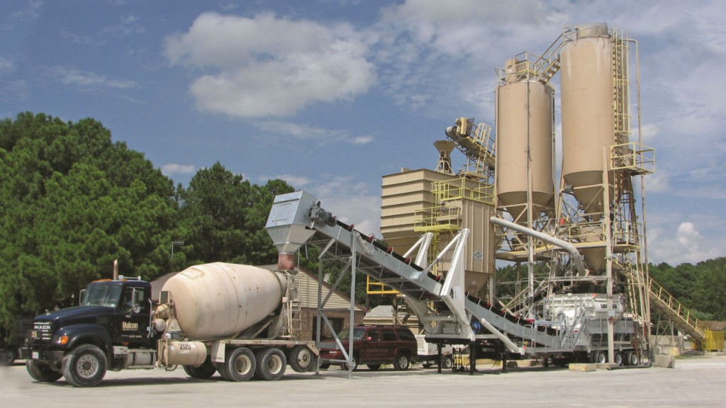The mixer is installed on a mobile trailer unit and placed under a dry-mix plant for batching and mixing. 