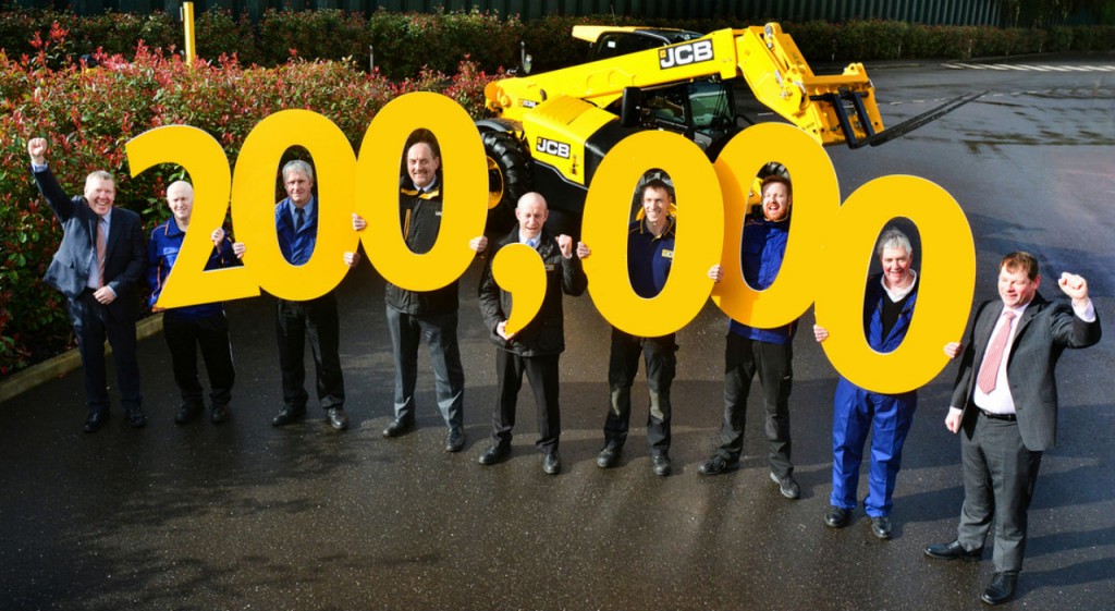 Loadall MD Ian Pratt (extreme L) and Loadall Operations Director Paul Grys (extreme R) join employees (L-R) Ian Vickery, Cliff Ferrie, Mick Smith, Dave Bailey, Nick Miller, Paul Stockley  & Richard Jenkinson in celebrating the 200,000th Loadall milestone.
