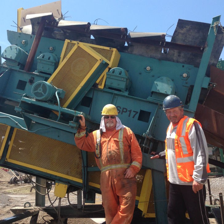 Waterford Group operators stand in front of a 73-year-old Tyler F-Class vibrating screen. The four-bearing screen was called a Ty-Rock Screen when R.E. Law Crushed Stone bought it in 1943. It’s been in operation most years since.