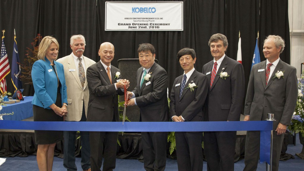 KOBELCO officials and special guests of the community participate in a ceremonial ribbon cutting.