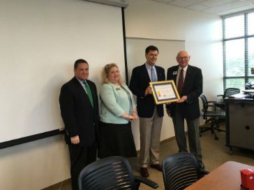 Otto’s Director of Export Sales Travis Dowell receives an Export Excellence Award for sales performance in 2014-2015. Pictured from left to right: Wayne King, Deputy Chief of Staff for Congressman Mark Meadows, Robin Ramsey, Field Representative for Senator Richard Burr’s Office, Travis Dowell of Otto Environmental Systems North America, Inc., and Wayne Cooper, Honorary Consul for Mexico and Chairman of the North Carolina DEC (District Export Council).