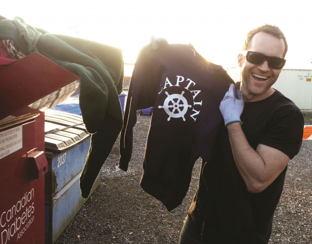 Eamonn Duignan, co-founder of GCR, on the road collecting used clothing for donation.