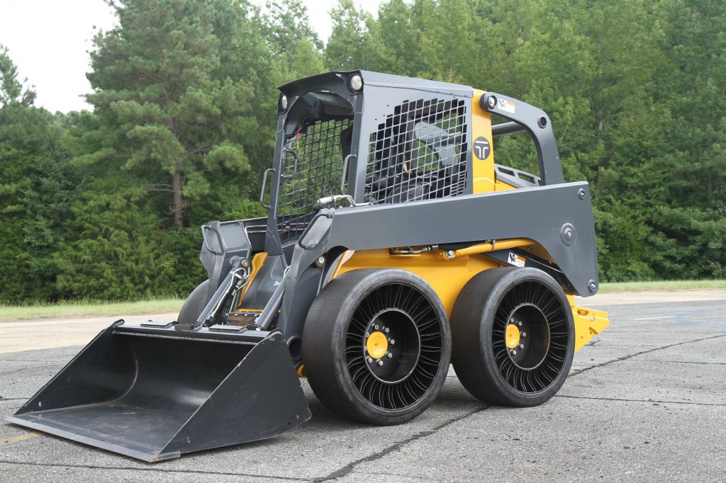 MICHELIN X TWEEL SSL Hard Surface on skid steer. The TWEEL SSL Hard Surface is designed for operators who are involved with construction, transfer stations, waste handling, pavement maintenance or material handling and benefit from a hard surface version of an airless radial skid steer tire. 