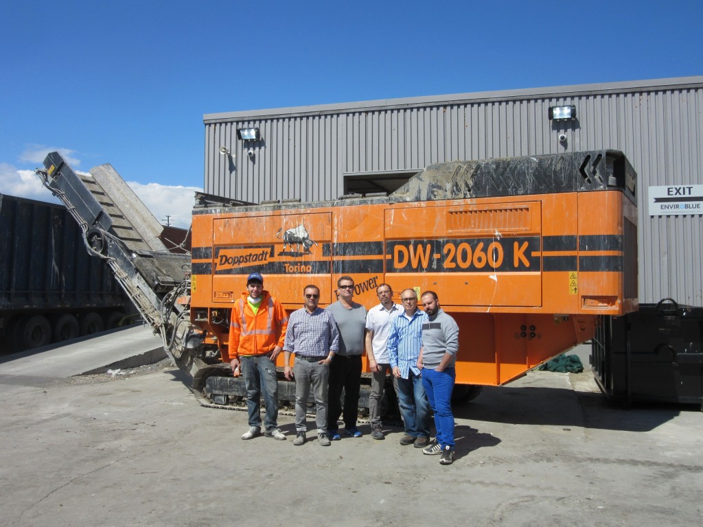 The crew at Enviro Blue Transfer and Recycling, near Toronto, with their Doppstadt SW 2060K BioPower shredder.