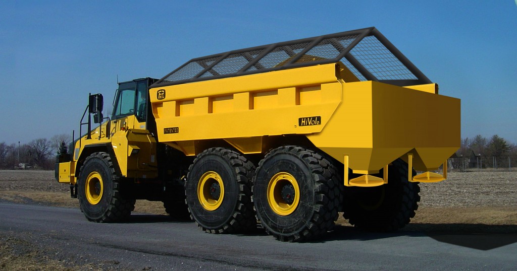 Haul truck operators can easily adjust material spread rate and width from the cab. The PHIL Material Spreader easily spreads road grit, sand or other material ranging in size from very fine to 2 inches.