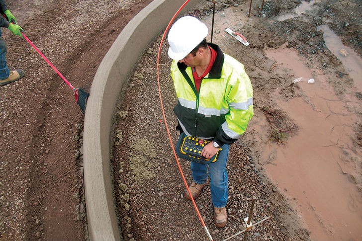 The GOMACO G+ Remote is available for use with any GOMACO three-track curb and gutter machine currently equipped with the G+ Operating System. The GOMACO G+ Remote is available for use with any GOMACO three-track curb and gutter machine currently equipped with the G+ Operating System.