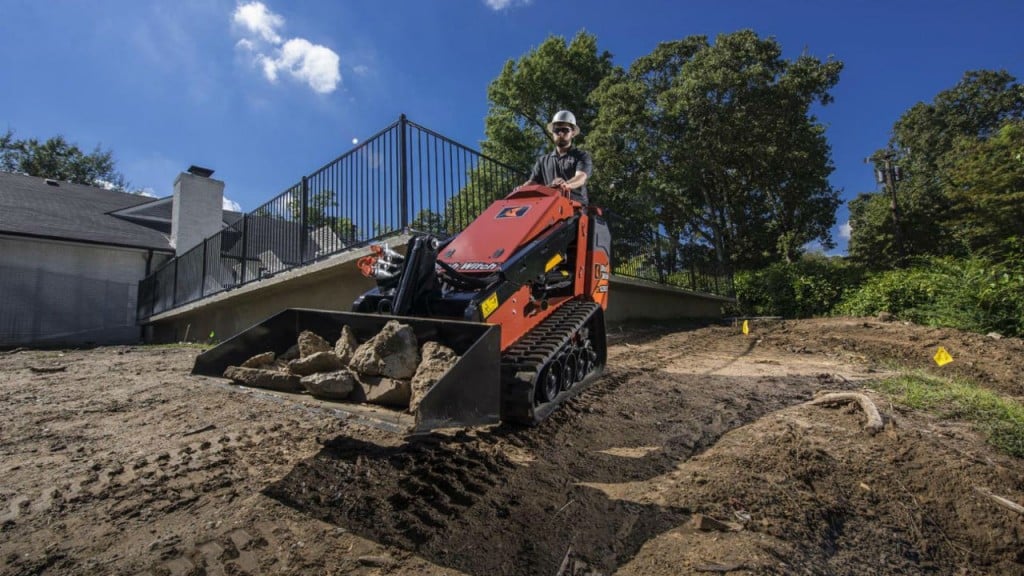 The SK1050 mini skid steer, offers easy access to the machine undercarriage and no daily maintenance points or grease zerks to help ease maintenance and reduce total cost of ownership.