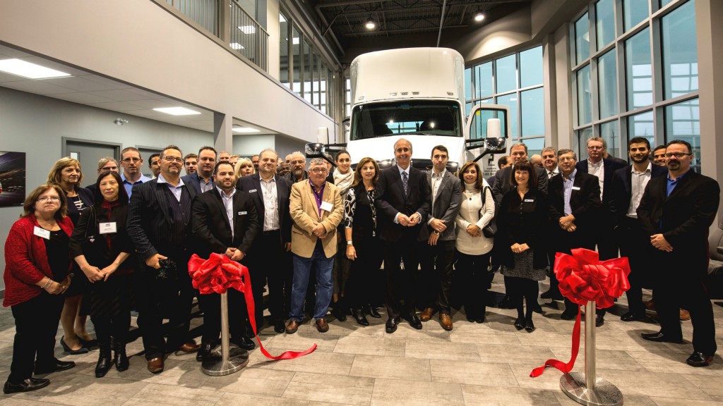 Employees at Kenworth Truck Centres - Cambridge celebrate the opening of the dealership's new, spacious and state-of-the-art facility in Cambridge to replaces its former Kitchener location. 